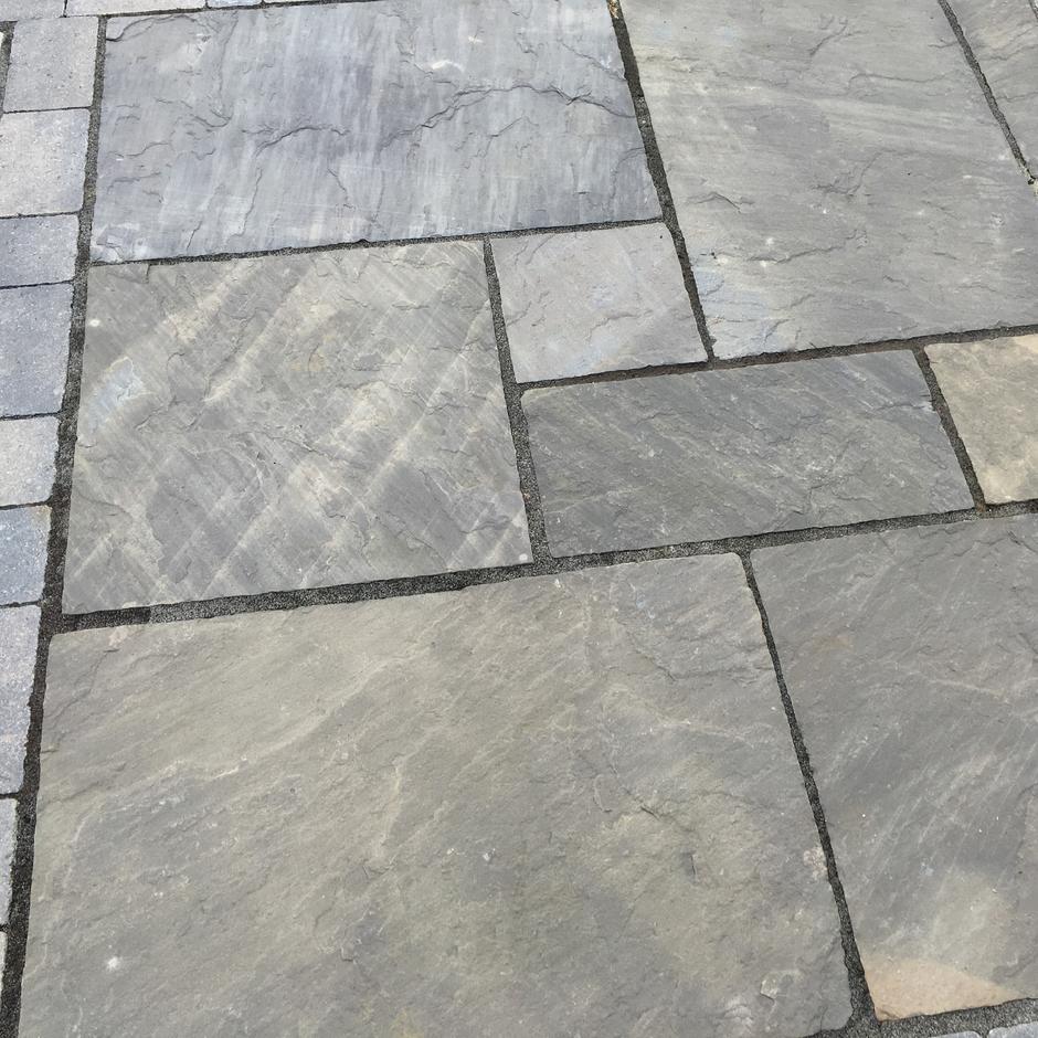 Grey and light brown hues with grout paving