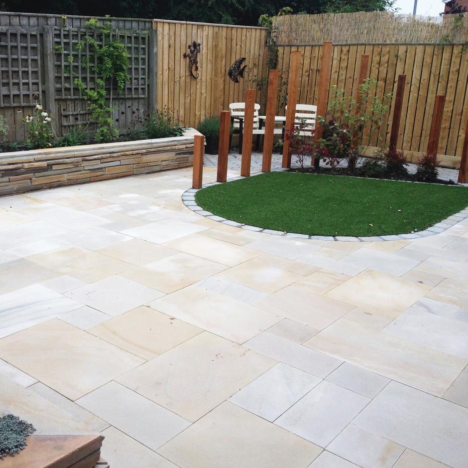 Sawn Tallow Fossil Sandstone garden paving with artificial grass